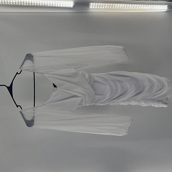 Elegant White Dress With Semi Transparent Sleeves - Picture 9 of 16